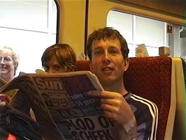 Michael caught reading The Sun on the train from Carlisle to Newton Abbot - a passenger left it on the train and there was nothing else to read!
